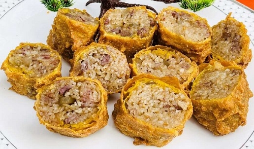 Banana Rice Cake Roll yang tampak sederhana adalah hidangan kuno yang diwariskan oleh Kakek Huang Jinquan (Kin Sen) (Foto / Diambil dari situs Pariwisata Tainan - Disediakan oleh Lu Zhengzhi)